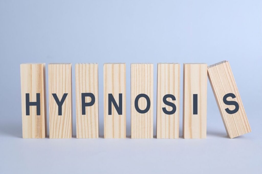 wooden blocks spelling out Hypnosis