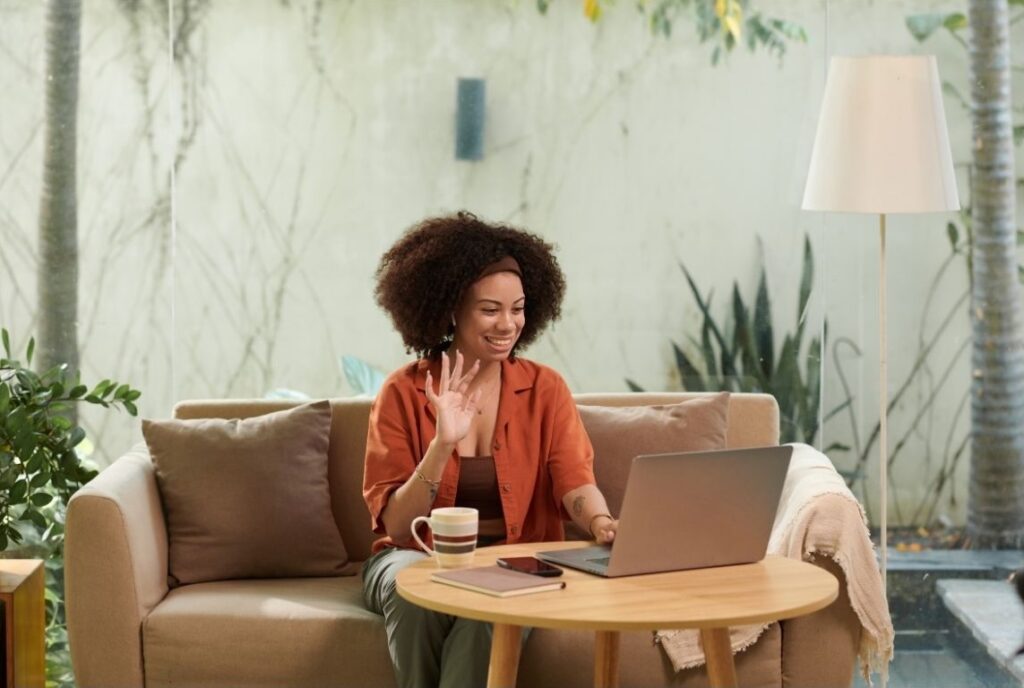 Lady having an online hypnosis session