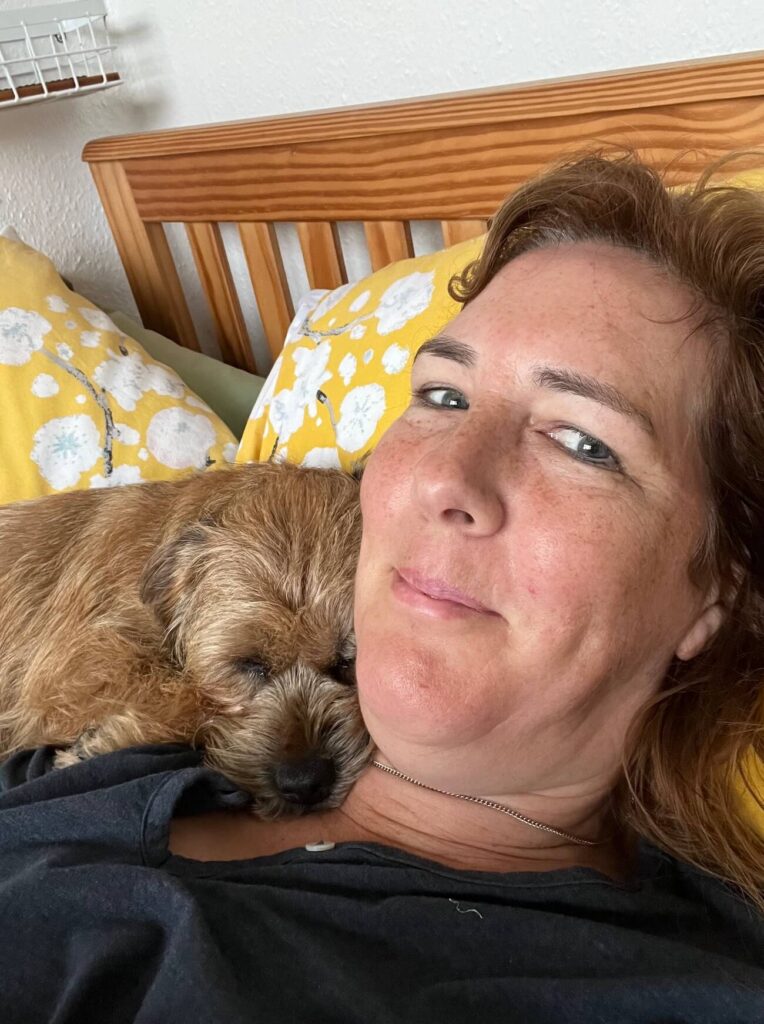 Jackie Slora of Freedom Evolution with her dog